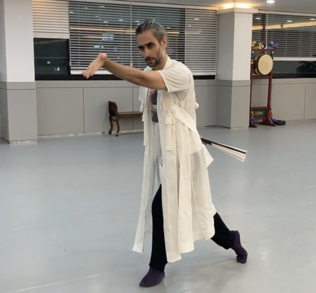 Photo showing me dancing in a dance studio.